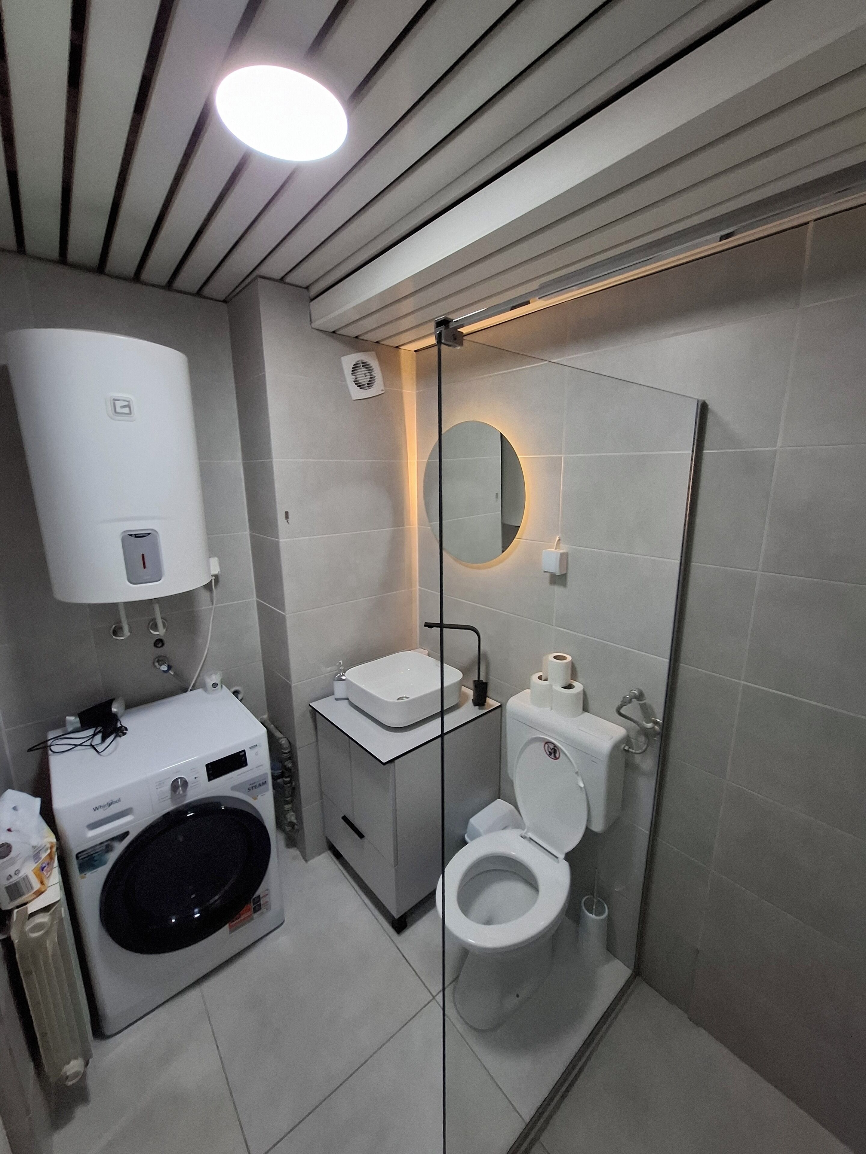 Shower, free toiletries, hair dryer, slippers