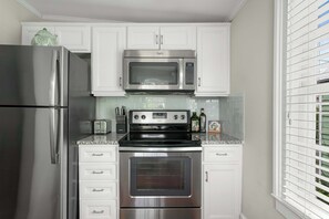 Fridge, microwave, oven, stovetop - Historic 2BR Suite Steps to King St (Charleston)