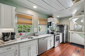 Fridge, microwave, oven, stovetop - Luxe 1840s House w. Parking, Porches, 4 King Beds! (Charleston)