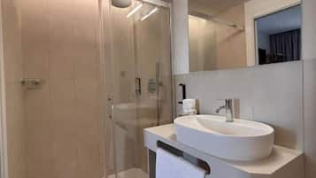Shower, free toiletries, hair dryer, towels