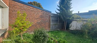 Quiet apartment with private garden and parking space