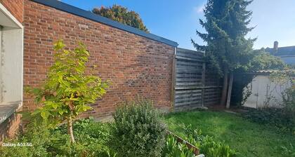 Appartement au calme, avec jardin privatif et place de parking