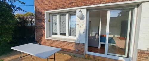 Quiet apartment with private garden and parking space