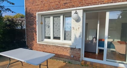 Quiet apartment with private garden and parking space