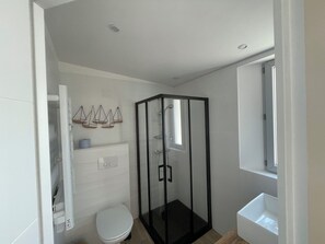 Shower, towels, toilet paper