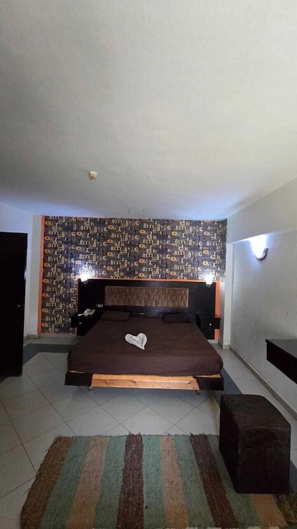 Habitación individual Deluxe, vista a la ciudad | Wifi gratis