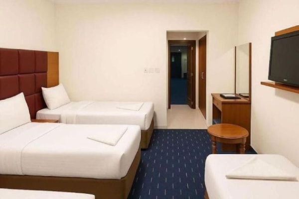 Deluxe Quadruple Room | Desk, soundproofing, free WiFi, bed sheets