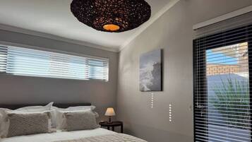 4 habitaciones, tabla de planchar con plancha, wifi y ropa de cama