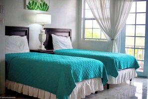 2 عدّة غرف نوم ومكواة/لوح كي وواي فاي وملاءات أسرّة