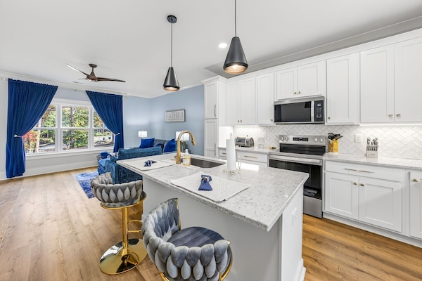 Kitchen area looking into den