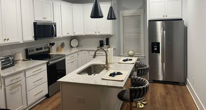 NEW home above garage! Walk to restaurants, shopping and entertainment!