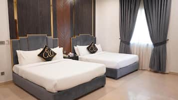 Executive Quadruple Room | In-room safe, desk, laptop workspace, soundproofing