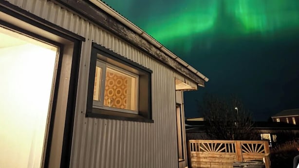 A house with a visible window and a view of the night sky. - 4-bedroom house in Höfn í Hornafirði (Höfn í Hornafirði)