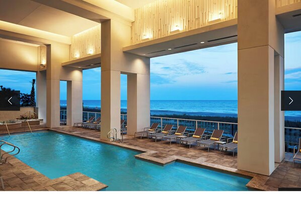 Outdoor pool, a heated pool - July 11-18, 2026 - 2 bdr/2 bath Oceanfront unit at Hilton's Ocean Enclave (Myrtle Beach)