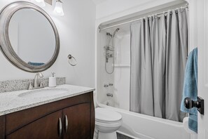 Hair dryer, towels, soap, toilet paper