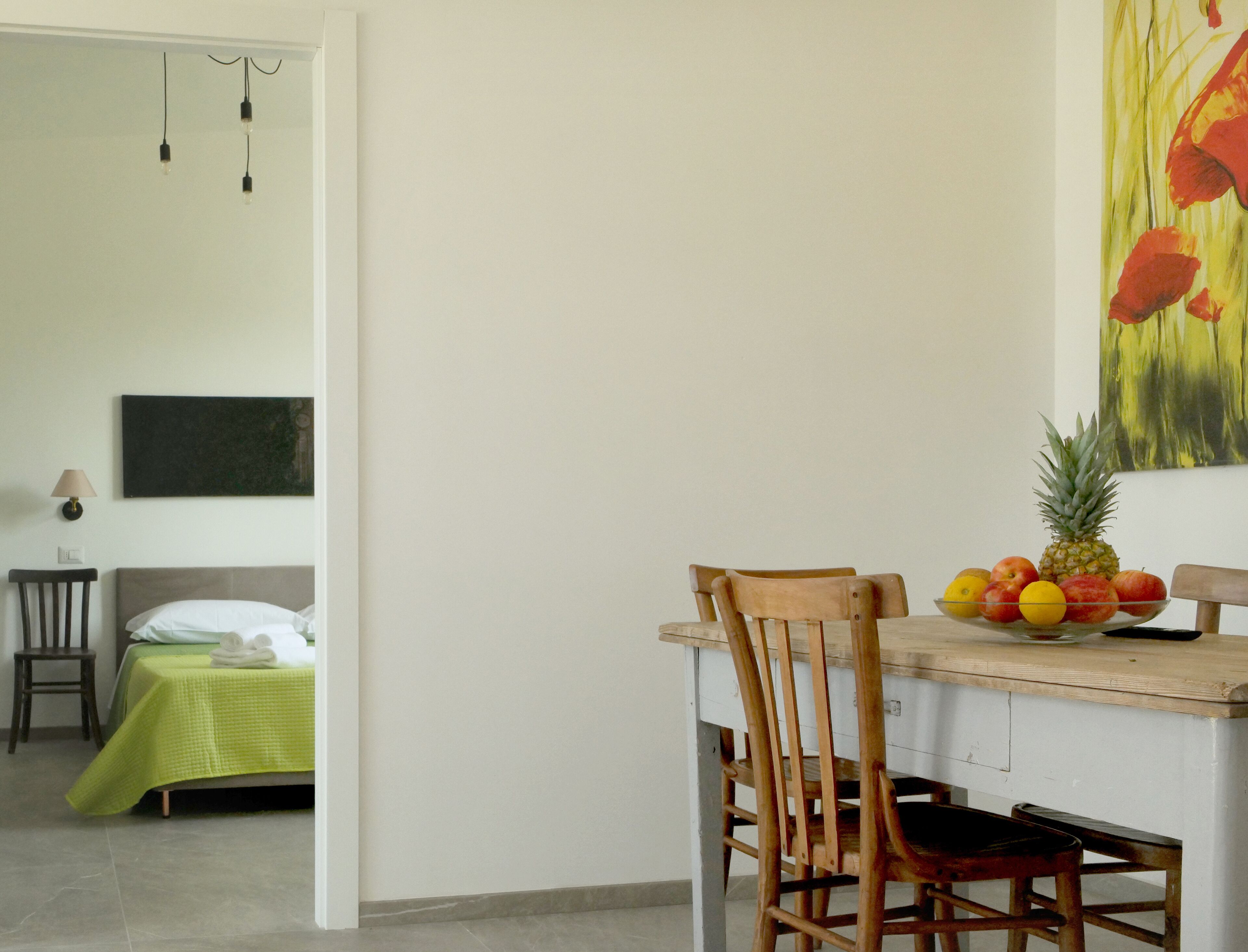 Suite Deluxe, patio, vue piscine | Coin séjour