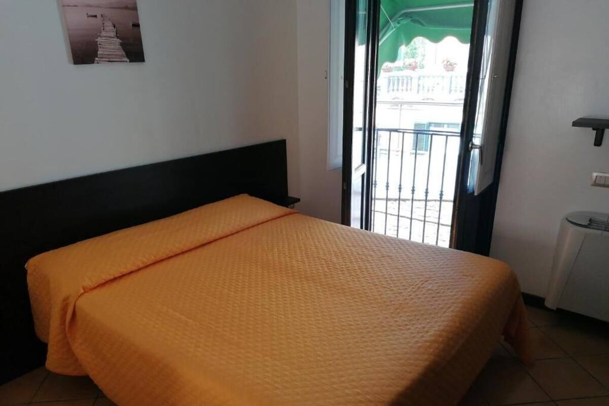 Triple Room | Desk, laptop workspace, blackout drapes, free WiFi