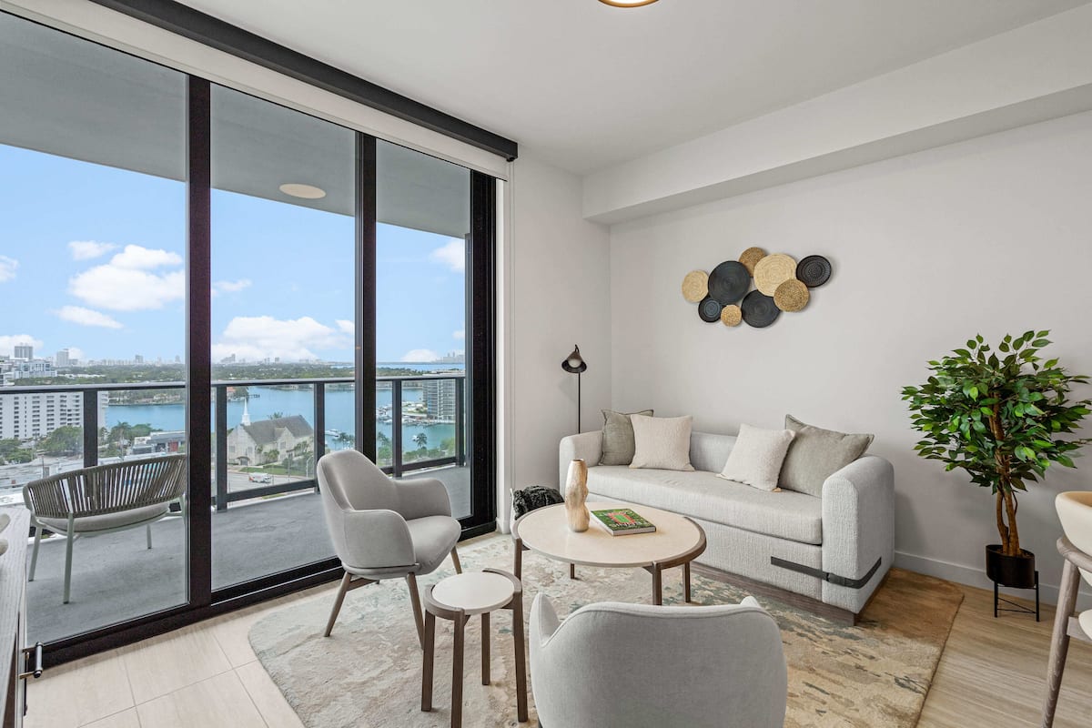 Luxury Condo | Living area | 10-inch Smart TV with cable channels