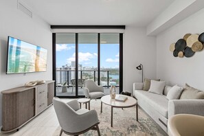 Luxury Condo, 1 Bedroom | Living area | 10-inch Smart TV with cable channels - Elegant Miami Beach Condos (Miami Beach)