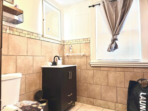 Hair dryer, towels, soap, toilet paper