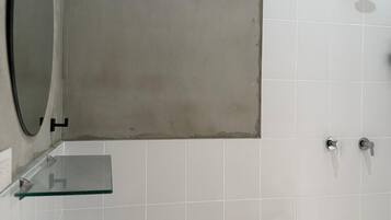 Shower, hair dryer, towels, toilet paper