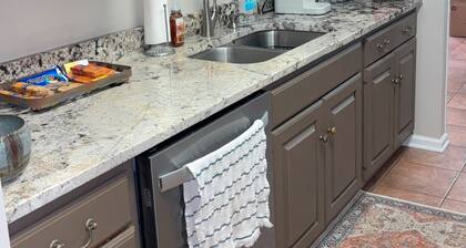 Charming condo 3-bedroom 2 bath, 2 living rooms! Stocked kitchen, laundry room