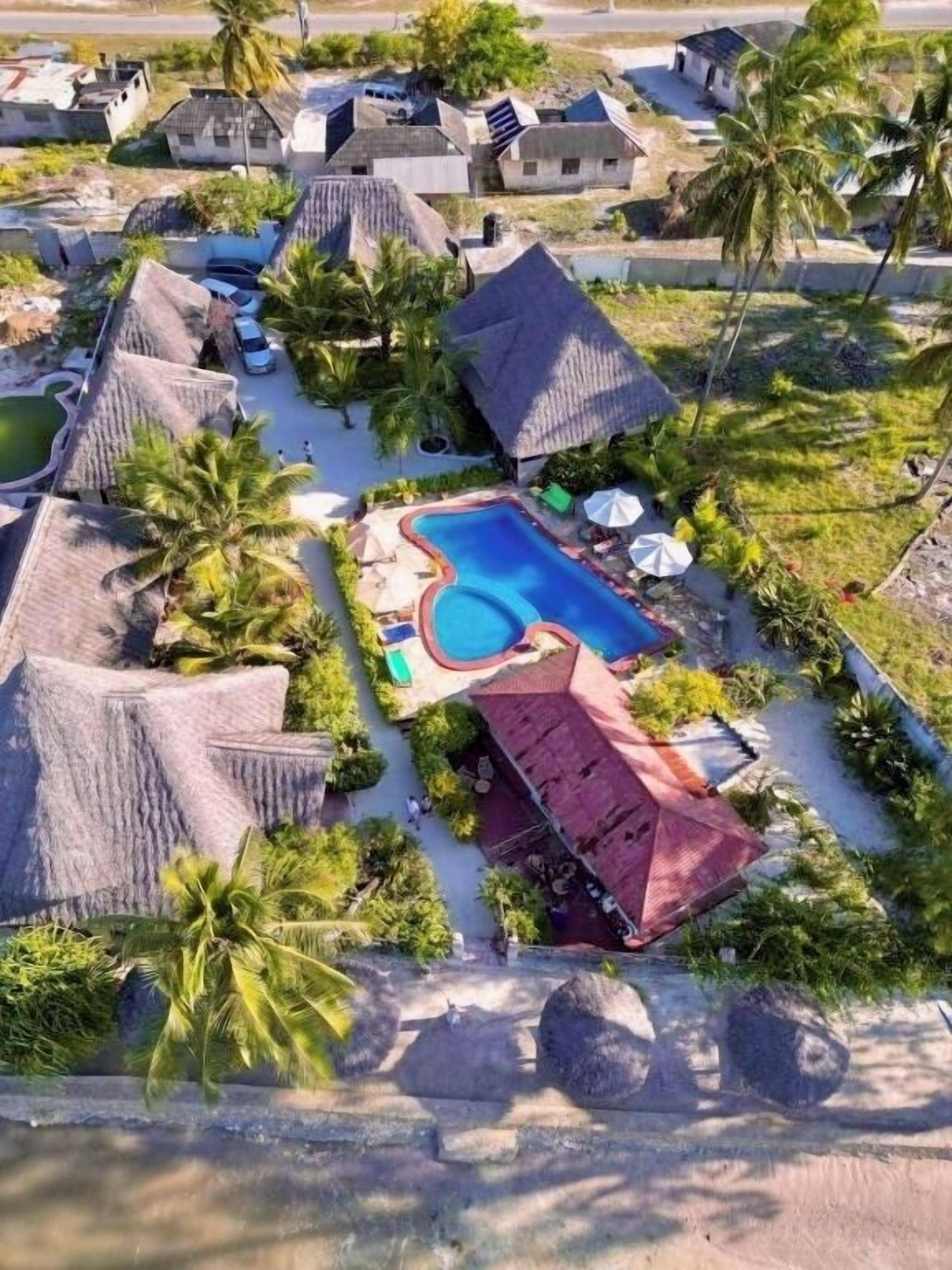 Outdoor pool, free pool cabanas, pool umbrellas