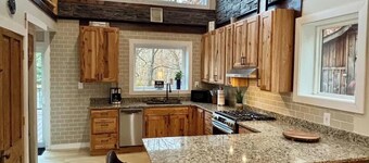 Tidioute Riverfront Chalet