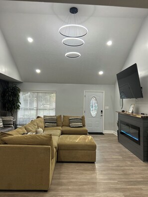Smart TV, fireplace, books