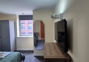 Comfort Apartment, City View | Blackout drapes, iron/ironing board, free WiFi