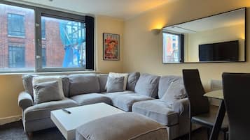 Departamento Confort, vista a la ciudad | Área de sala de estar