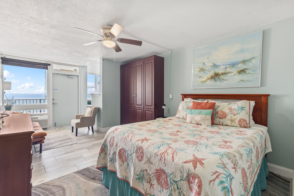 Image showcasing Cozy oceanfront studio with private balcony, kitchenette, and beautiful ...