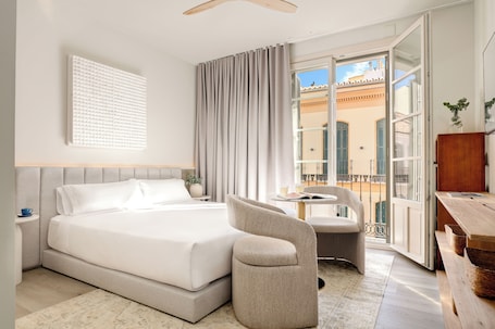 Studio Classique, vue ville | Literie de qualité supérieure, minibar, rideaux occultants. Coeo Frailes Design Apartments