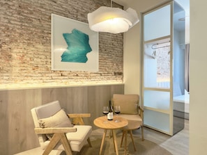 Superior Studio, City View | Living area | 50-inch flat-screen TV with digital channels, Netflix