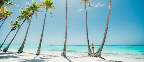 Beach nearby, white sand, beach towels, beach massages