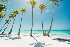 Beach nearby, white sand, beach towels, beach massages