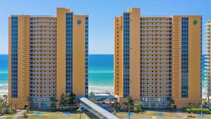 Two high-rise buildings with balconies, a beach, and a clear view of the ocean. - Spacious 3BR/3BA Splash Condo & Amazing Gulf Views — Free Beach Chairs Included! (Panama City Beach)