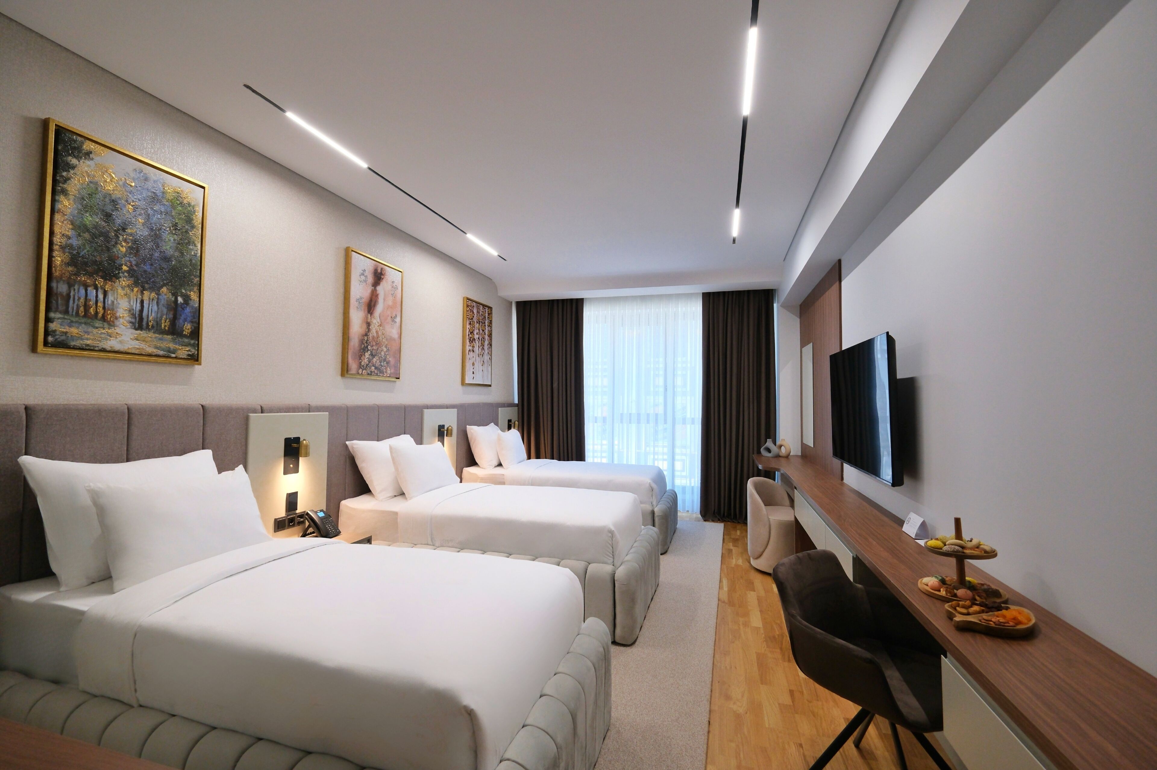 Deluxe Triple Room | Premium bedding, minibar, desk, laptop workspace