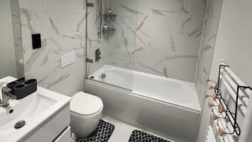 Hair dryer, towels, soap, toilet paper