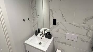 Hair dryer, towels, soap, toilet paper