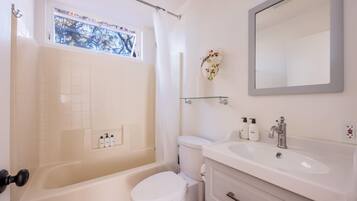 Hair dryer, towels, soap, toilet paper