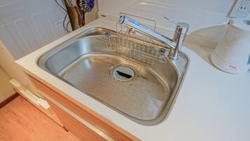 Classic Quadruple Room, 2 Double Beds, Non Smoking, Private Bathroom | Private kitchen | Full-sized fridge, microwave, stovetop, cookware/dishes/utensils