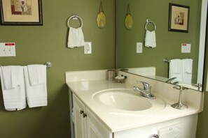 Jetted tub, towels, toilet paper