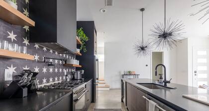 Modern Oasis: Rooftop Sunsets & City Lights!