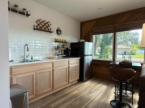 Fridge, microwave, stovetop, coffee/tea maker