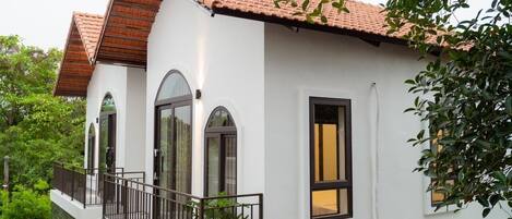 Quarto luxo, vista para o jardim | Terraço/pátio