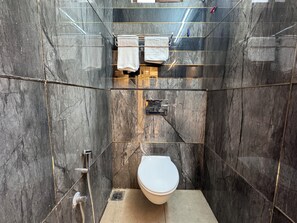 Standard Double Room | Bathroom | Shower, rainfall showerhead, towels, soap - Kaarthik Residency (Puducherry)
