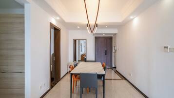 Superior Apartment, 3 Bedrooms, Kitchen, City View | Living room | 55-inch Smart TV with cable channels