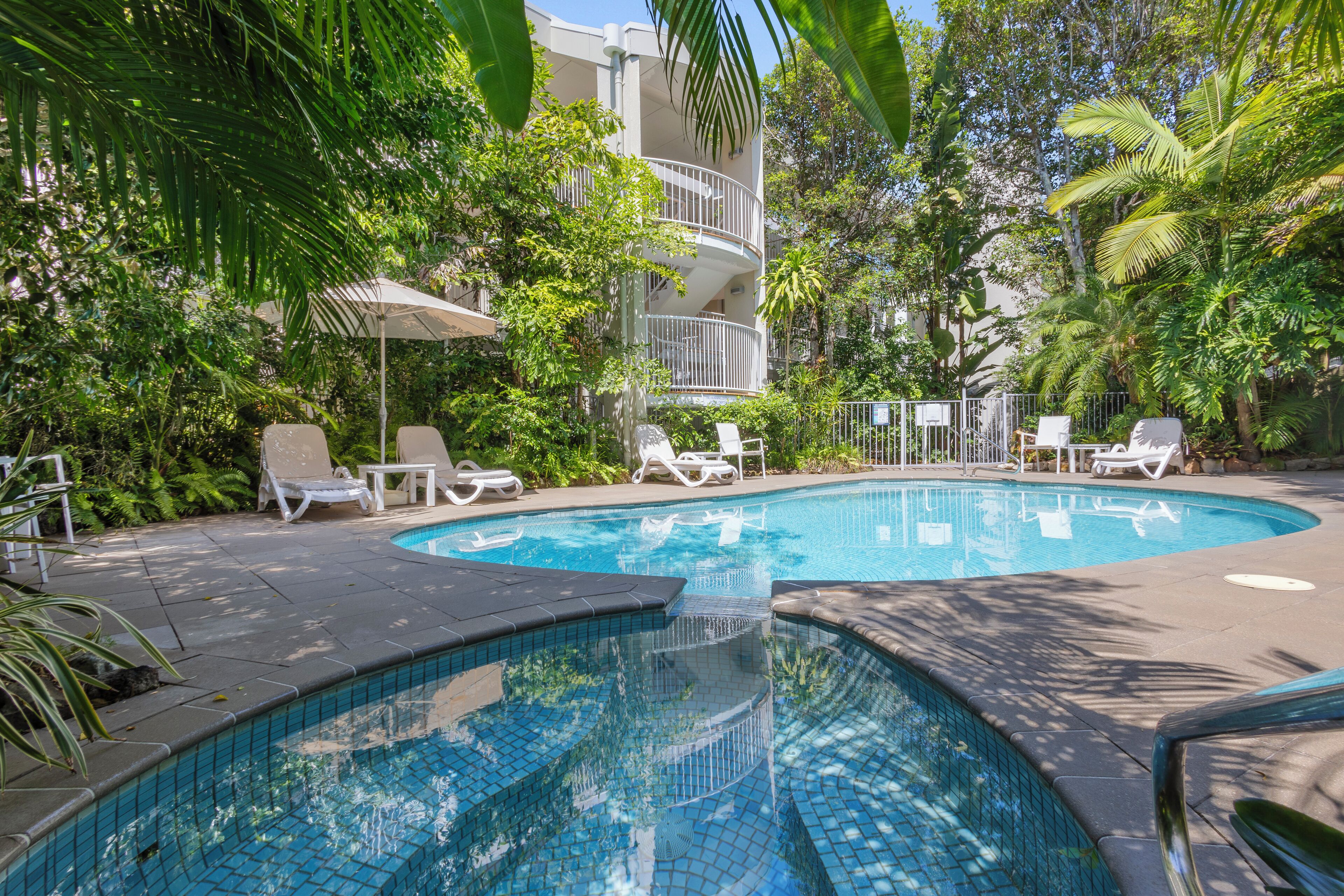 Outdoor pool, pool umbrellas, sun loungers