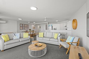 Deluxe Apartment, Balcony, Sea View | Living area | TV